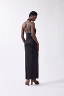 Model wearing the Nautilus Plunge Maxi Dress back, made from 96% viscose 4% elastane, styled for a night out look