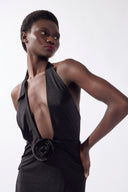 Model wearing the Nautilus Plunge Maxi Dress detail, made from 96% viscose 4% elastane, styled for a night out look