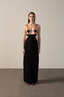 Model wearing the Nipple Long Dress black front from the HS25 with 76.3% Polyamide 23.7% Elastane styled for a date look.    