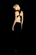 Model wearing the Open Back Maxi Dress black front from the Adriana Degreas and Sabine Getty collab with 96% Viscose 4% Elastane styled for a evening look.