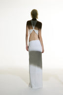 Model wearing the Open Back Maxi Dress off white back from the Adriana Degreas and Sabine Getty collab with 96% Viscose 4% Elastane styled for a evening look.
