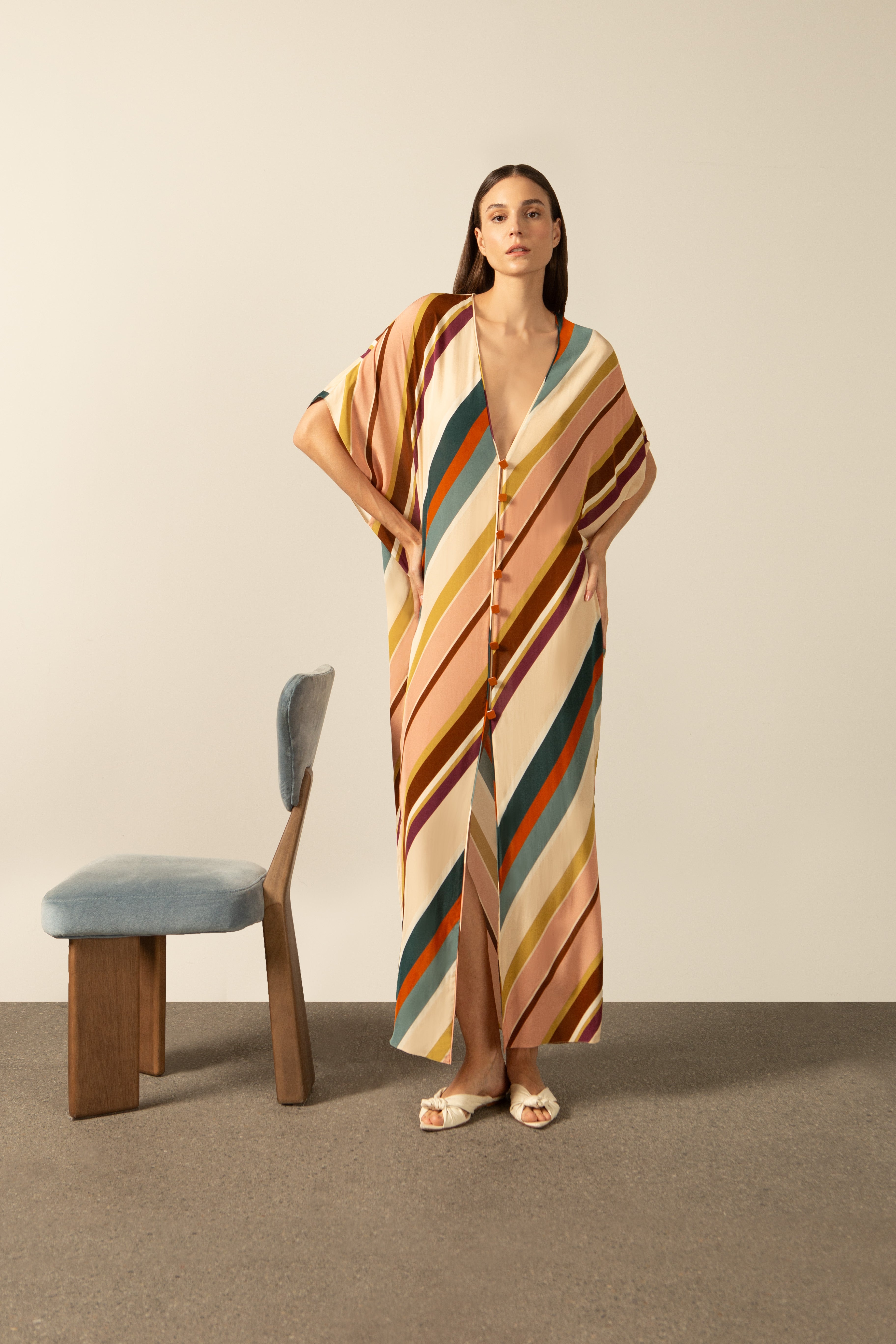 Model wearing the Organic Stripes Long Kaftan unique color front from the HS25 with100% viscose styled for a lunch look.   