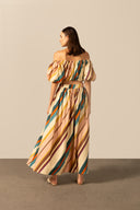 Model wearing the Organic Stripes Long Skirt  unique color back  from the HS25 with 97% Cotton 03% Elastane styled for a lunch look.   