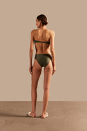 Model wearing the Oyster Hot Pants 3D Bikini Back showcasing its Croco Green color on 85% polyamide 15% spandex fabric.