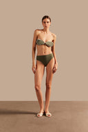 Model wearing the Oyster Hot Pants 3D Bikini Front showcasing its Croco Green color on 85% polyamide 15% spandex fabric.