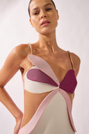 Model wearing the Petal Appliqué Swimsuit detail color unique, made from 85% polyamide 15% elastane, styled for a beachwear look