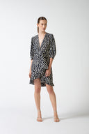 Model wearing the Pois Plunge-Neck Short Dress navy front from the HS25 with 100% viscose styled for a drinks at date look.    