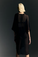 Model wearing the Ruched Sheer Mini Dress back from the Adriana Degreas and Sabine Getty collab with 100% Silk styled for a casual look. 