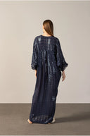 Model wearing the Sequins Maxi Kaftan  back navy color front from the HS25 with 100% polyester styled for a drinks at the boat look.  
