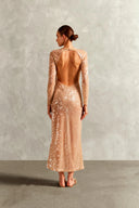 Model wearing the Sequins Open-Back Long Dress back with 100% polyester fabric styled for a dinner look