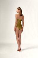 Model wearing the  Solid Appliqué Swimsuit back color pistache with 85% Polyamide 15% Elastane styled for a beachwear look
