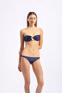 Model wearing the Solid Bandeau Bikini front color navy made from 85% plyamide 15% elastane, styled for a beachwear look