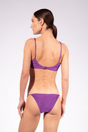 Model wearing the Solid Chain Bikini back color purple made from 85% polyamide 15% Elastane fabric, styled for a beachwear look
