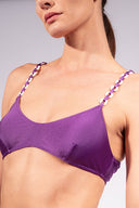 Model wearing the Solid Chain Bikini detail color purple made from 85% polyamide 15% Elastane fabric, styled for a beachwear look