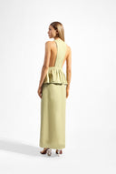 Model wearing the Solid Deep V-Neck Peplum Maxi Dress back color green made with 97% Cotton 3% Elastane, styled for resortwear look