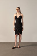 Model wearing the Solid Frilled Midi Dress front color black made from 85% polyamide 15% elastane, styled for a dinner look