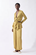 Model wearing the Solid Front-Tie Shirt look color pistachio, made from 100% viscose, styled for a dinner look