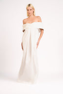 Model wearing the Solid Off-The-Shoulder Maxi Dress color off white made from 97% cotton 3% elastane, styled for a party look