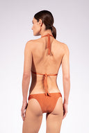 Model wearing the Solid Triangle Bikini back color cognac with 85% Polyamide 15% Elastane, styled for a beachwear look
