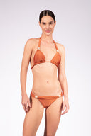 Model wearing the Solid Triangle Bikini color cognac with 85% Polyamide 15% Elastane, styled for a beachwear look