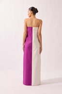 Model wearing the Strapless Maxi Dress petal back color off white, made from 97% cotton 03% elastane, styled for a dinner look