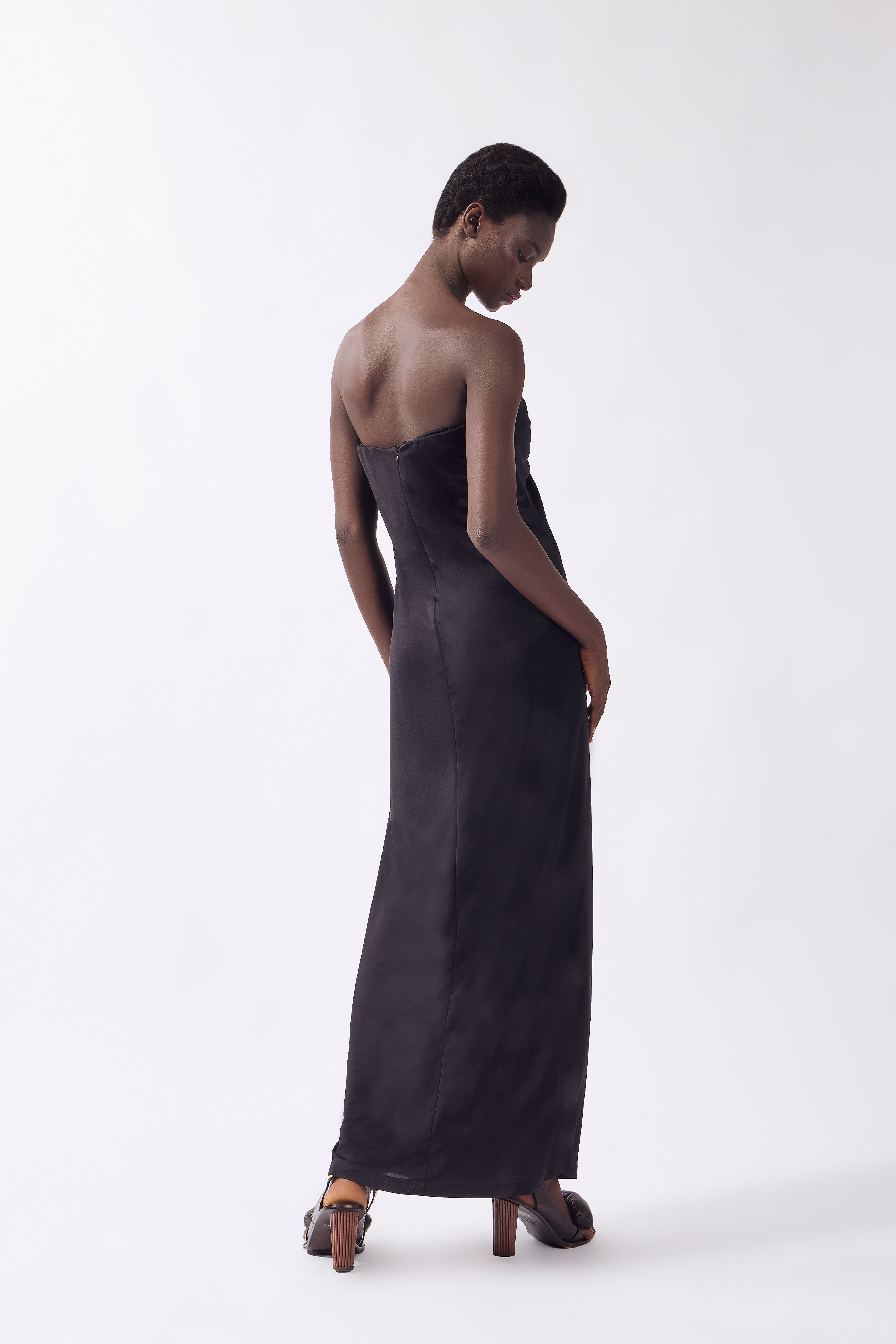 Model wearing the Structured Maxi Dress back, made from 96% viscose 6% elastane, styled for a night out look