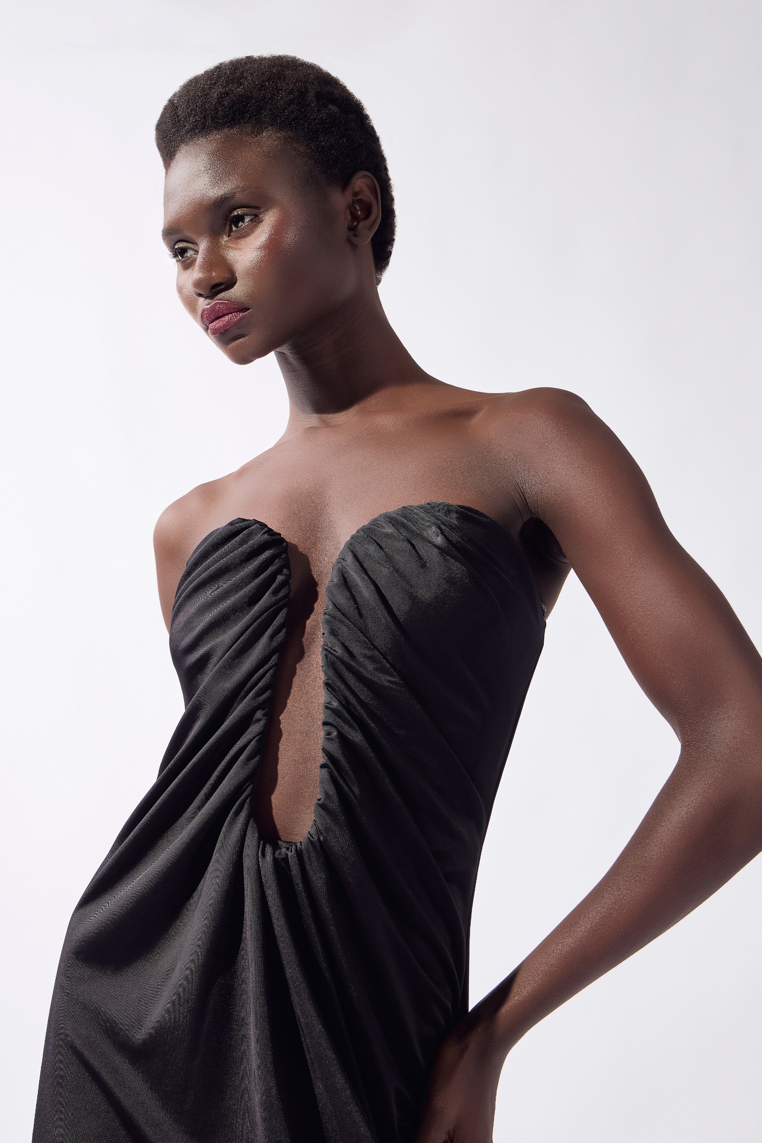 Model wearing the Structured Maxi Dress detail, made from 96% viscose 6% elastane, styled for a night out look