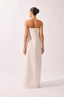 Model wearing the Structured Maxi Dress back color off white, made from 97% cotton 03% elastane, styled for a dinner look