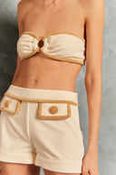 Model wearing the Terry Top & Short Set Close showcasing its Off White and Beige print on 86% Cotton 14% Polyester fabric, style for a resort look.