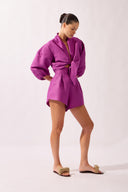 Model wearing the Tie-Front Crop Top look color purple, made from 55% linen 45% viscose, styled for a resort look