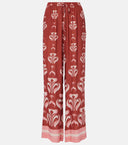Still image of the Vintage Lily Wide-Leg Pants with dark red and pink print, on a viscose fabric.