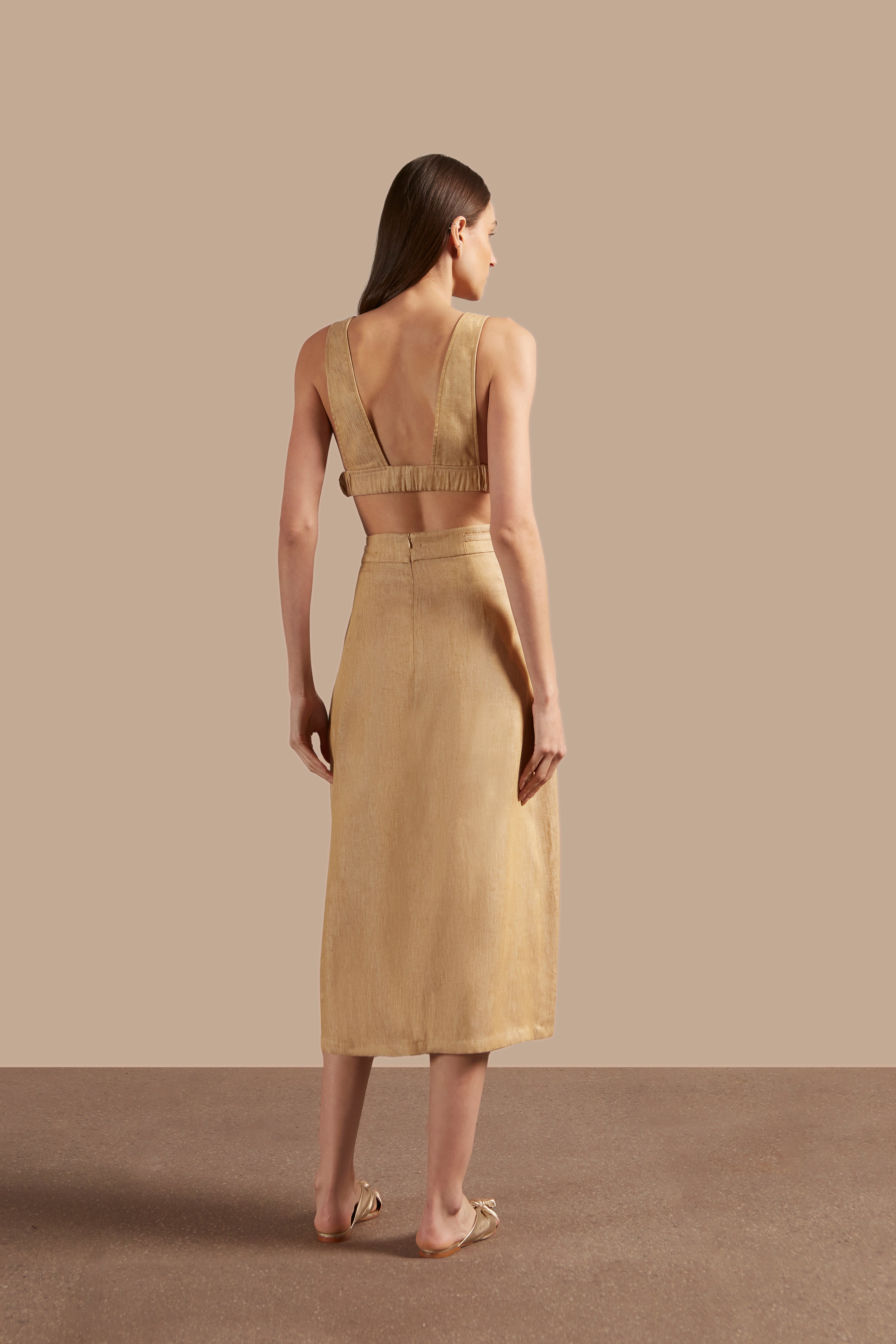 Back view of Adriana Degreas' Jeans V-Neck Top in denim-inspired caramel, featuring a deep V-neckline and wide straps.