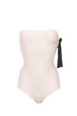 Sometimes all we need is a timeless piece like this sophisticated swimsuit in pale rose with black detail