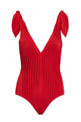 This swimsuit with deep V-neckline and plissé details is made in Brazil and is truly an object d´art