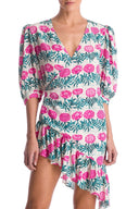 Crafted in silk, this cocktail dress has puffed sleeves and falls perfectly to an asymmetric hem