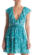 This botanical design takes you from beach-to-bar with its beautiful floral print and ruffled v-neck front detailing. Layer yours over a bikini with strappy sandals