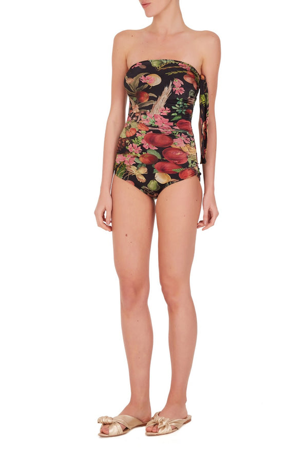This strapless style swimsuit has low-cut legs for a retro effect. It´s made with stretch fabric and ruched side with self-tie for a perfect fit