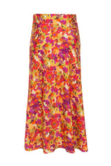 The fruit printed pareo skirt is shaped to wrap across the body and tie at the waist like a ballerina skirt