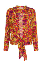 The retro fruit inspired silk shirt is shaped with a wide point collar, deep V- neck and waist ties for a flexible fit