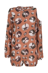 This silk horse pois playsuit is influenced by retro silhouettes
