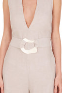 The chic lightweight linen-blend jumpsuit that comes with the matching belt with resin buckle detail has inspirations from vintage references from 1970’s style