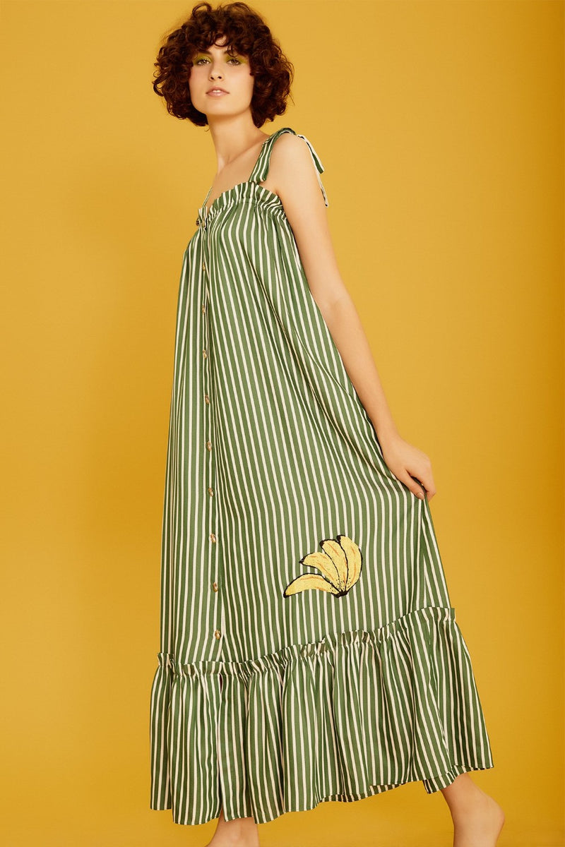 Inspired by South American roots, this white and yellow banana appliqué dress gives a fresh and elegant touch to your vacation wardrobe