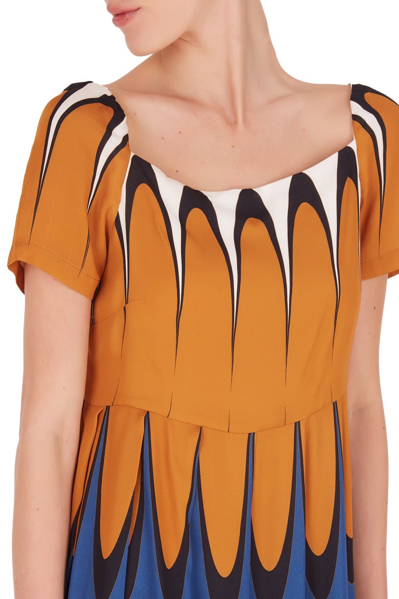 This pleated viscose dress has a romantic sleeve, loose silhouette and square neckline
