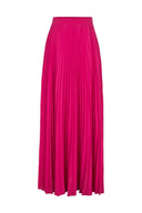 This Le Fleur pleated maxi skirt is perfect for vacations. Slip it on over the swimsuits in solid colors like purple for a sophisticated poolside look
