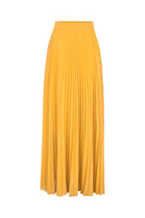 This Le Fleur pleated maxi skirt is perfect for vacations. Slip it on over the swimsuits in solid colors like purple for a sophisticated poolside look
