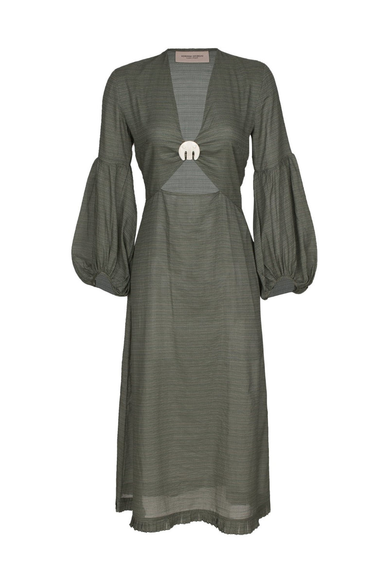 This dress can be worn as a cover up while lounging poolside or teamed with flat sandals for city walks
