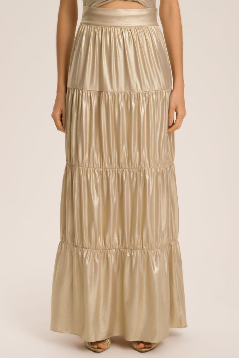 This long skirt is made of lightweight metallic fabric and can be worn in so many ways