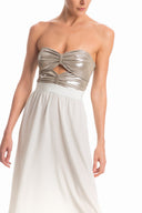 This charming and feminine strapless dress is made of silk with metallic top for a vintage allure