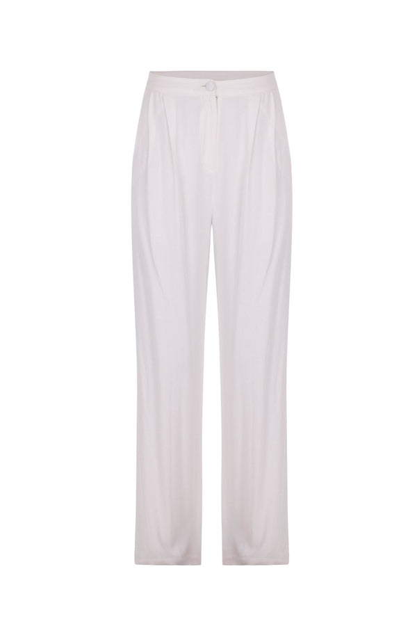 Adriana Degreas has an elegant approach to beach wear with key pieces like this wide leg silhouette silk pants