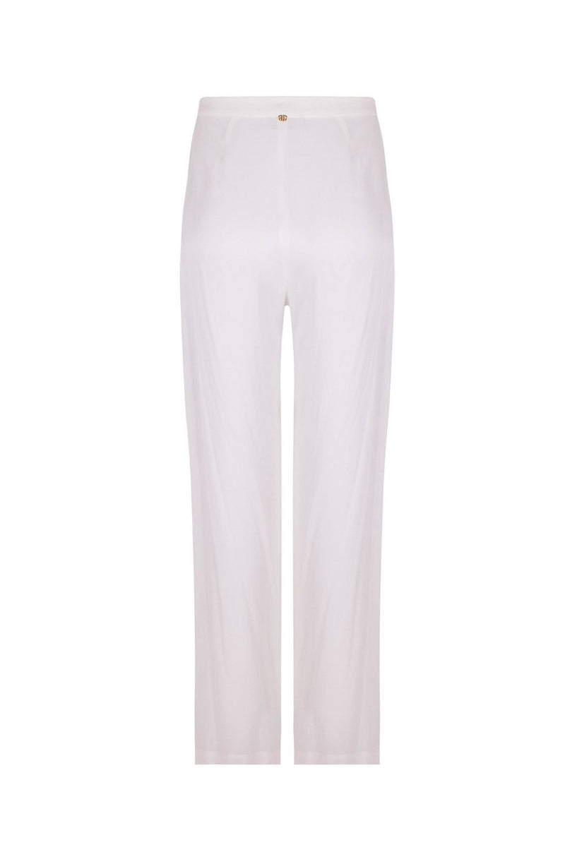 Adriana Degreas has an elegant approach to beach wear with key pieces like this wide leg silhouette silk pants
